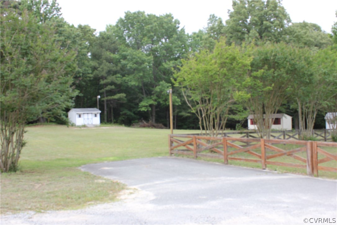 9321 Goodman Road Quinton, VA 23141 - Photo 42 of 44 PAVED DRIVEWAY AND STORAGE SHED