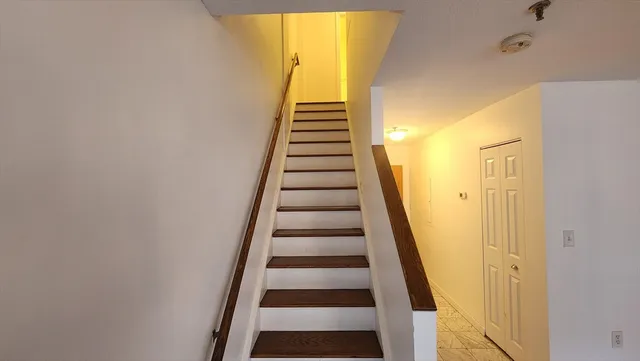 a view of entryway with wooden floor