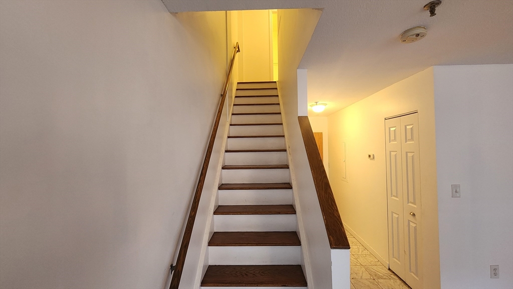 147 Kelton Street, Unit 706 Boston, MA 02134 - Photo 8 of 16 a view of entryway with wooden floor