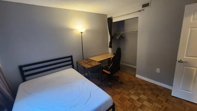 a room with furniture and a rug