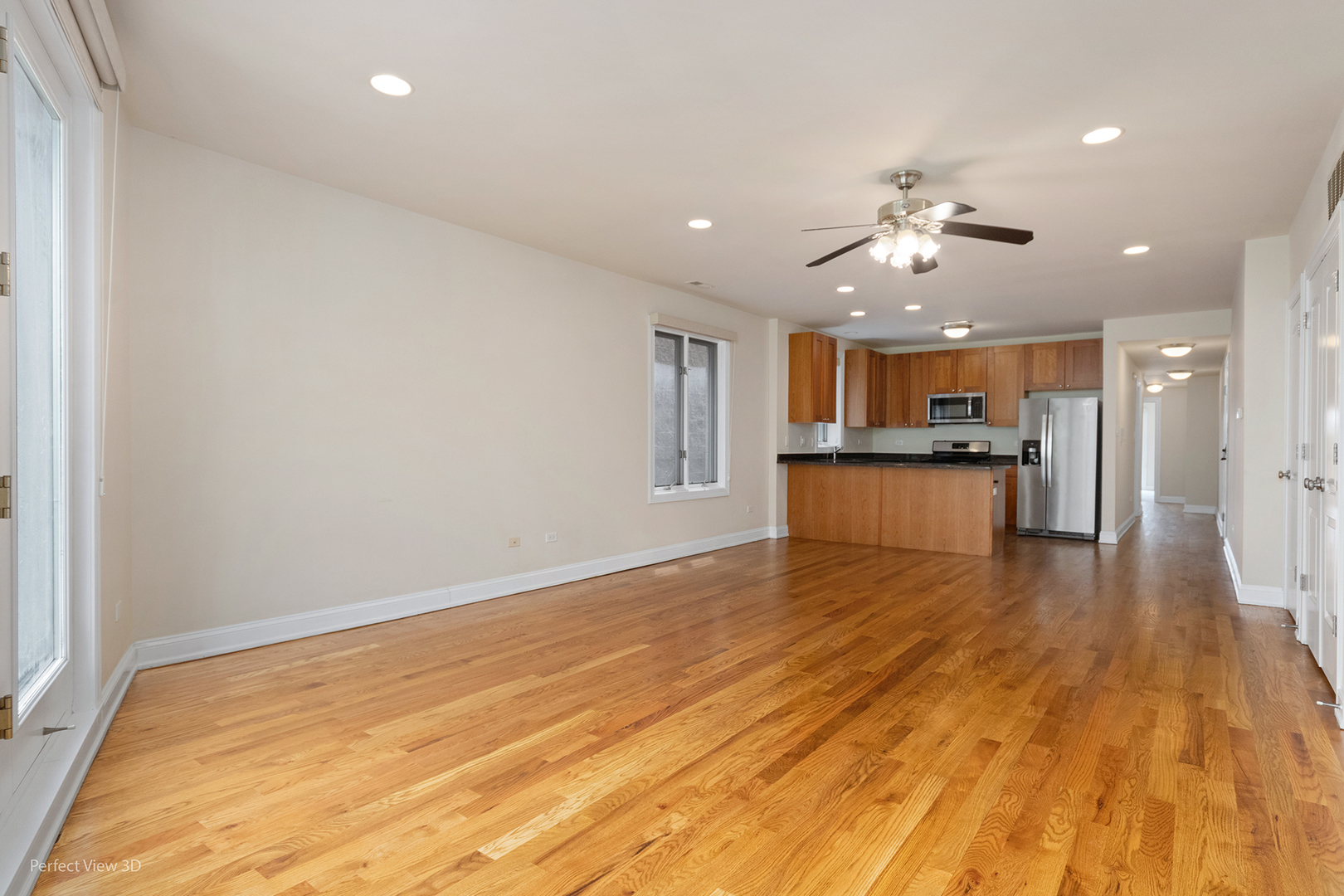 25 East 26th Street, Unit 4 Chicago, IL 60616 - Photo 3 of 24 a view of a kitchen with a sink and wooden floor