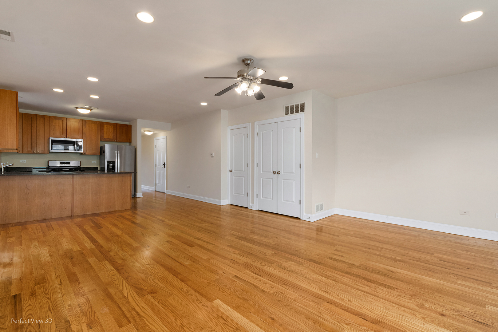 25 East 26th Street, Unit 4 Chicago, IL 60616 - Photo 6 of 24 a view of a kitchen with microwave and cabinets