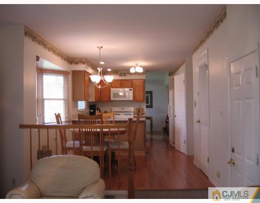 77 Princess Drive North Brunswick, NJ 08902 - Photo 3 of 7 a view of a dining room with furniture
