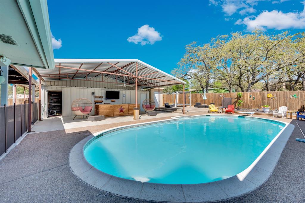 2263 Old Dicey Road Weatherford, TX 76085 - Photo 22 of 40 a view of a house with pool and chairs
