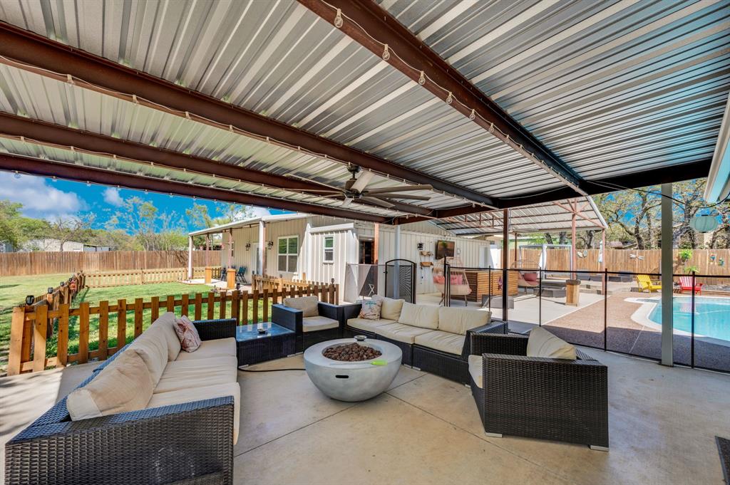 2263 Old Dicey Road Weatherford, TX 76085 - Photo 24 of 40 a outdoor living space with patio furniture and garden view