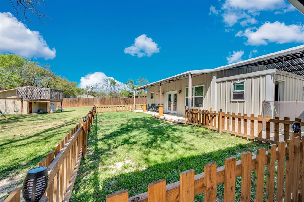 2263 Old Dicey Road Weatherford, TX 76085 - Photo 28 of 40 a view of a house with a yard