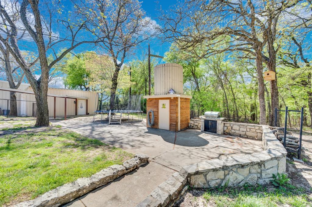2263 Old Dicey Road Weatherford, TX 76085 - Photo 37 of 40 a view of a house with backyard and sitting area