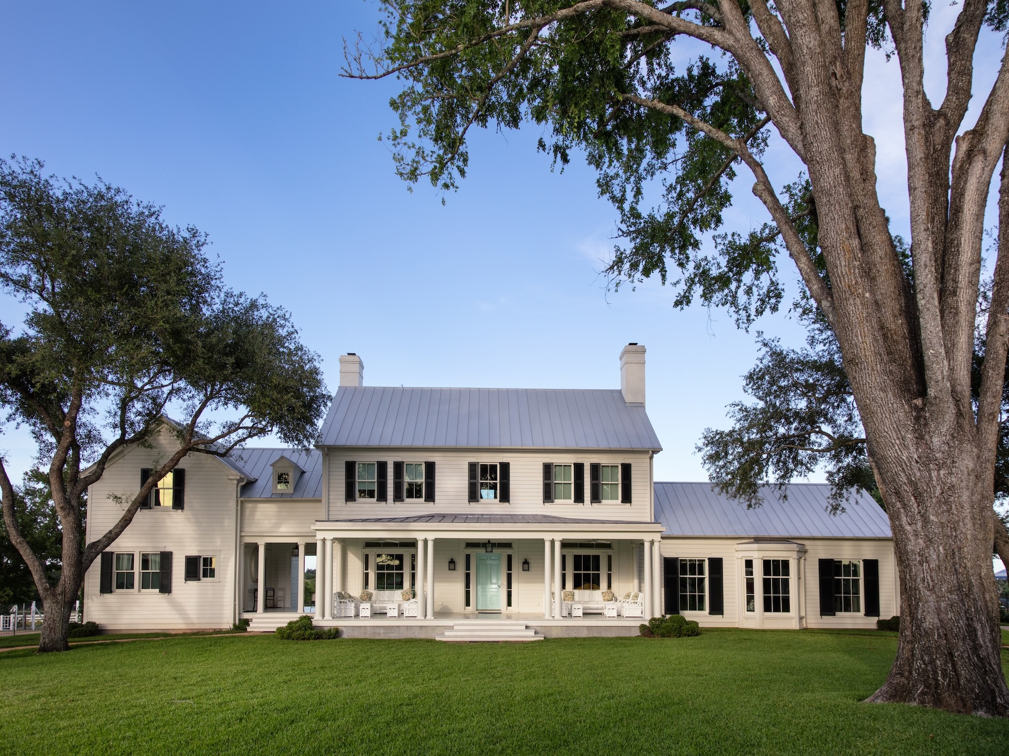 2228 Center Hill Road Bellville, TX 77418 - Photo 4 of 50 a front view of a house with a garden