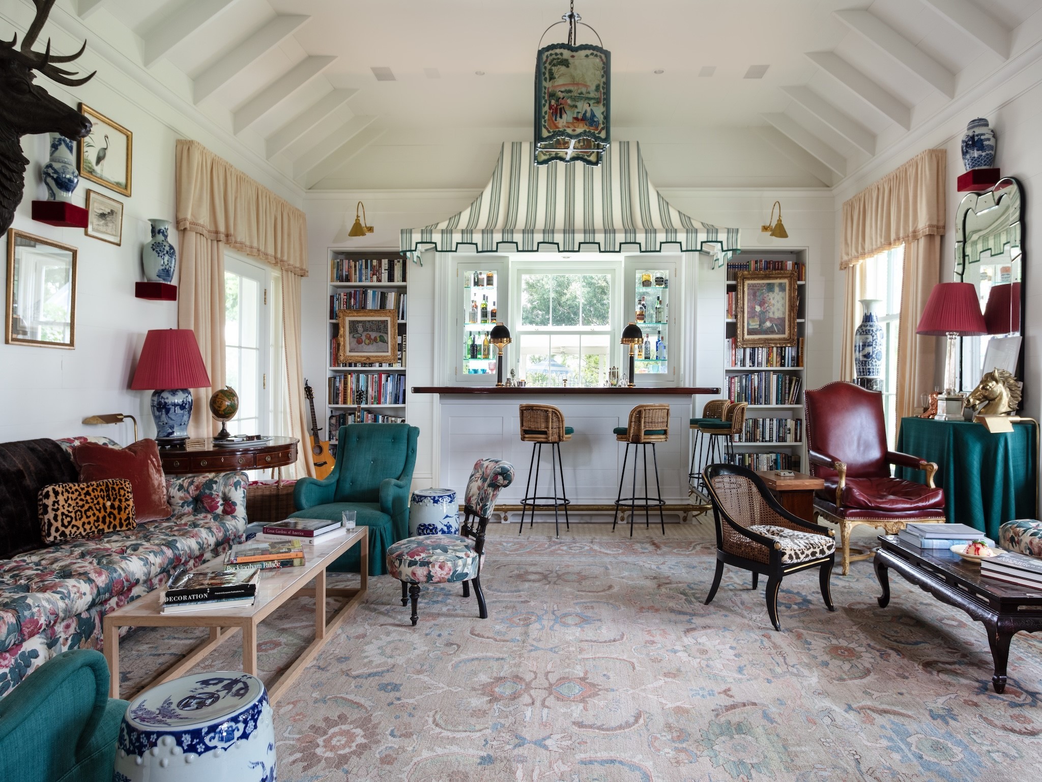 2228 Center Hill Road Bellville, TX 77418 - Photo 10 of 50 Living room with wet-bar is located off the dining room with doors leading to the screened-in porch. Window off of bar opens to the pool area.