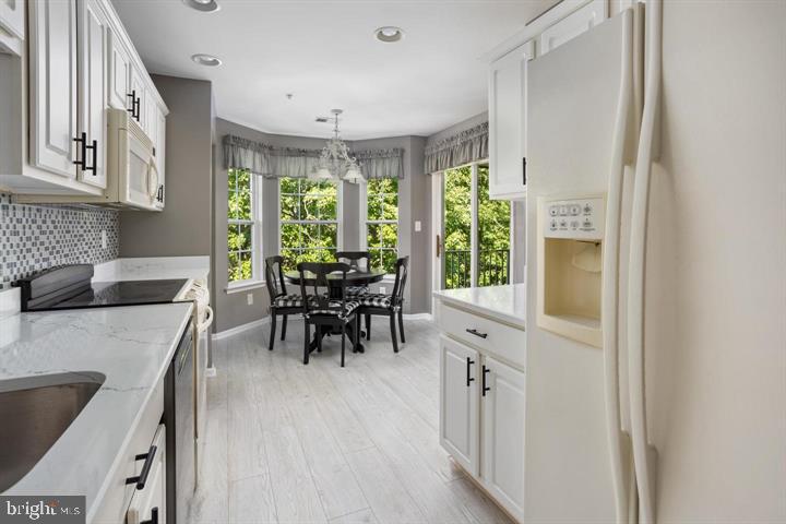433 Mowat Circle Hamilton, NJ 08690 - Photo 12 of 36 Bright and airy kitchen with views.