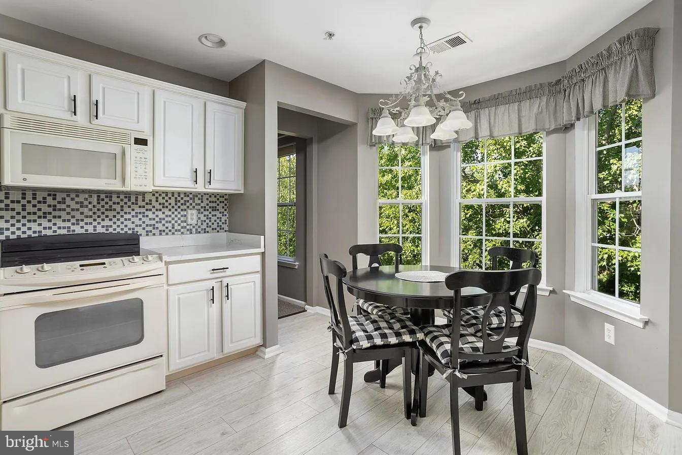 433 Mowat Circle Hamilton, NJ 08690 - Photo 13 of 36 Bright kitchen with scenic views.