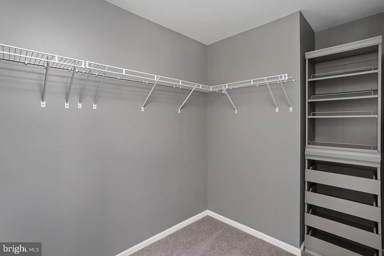 433 Mowat Circle Hamilton, NJ 08690 - Photo 20 of 36 Spacious closet with modern shelving.