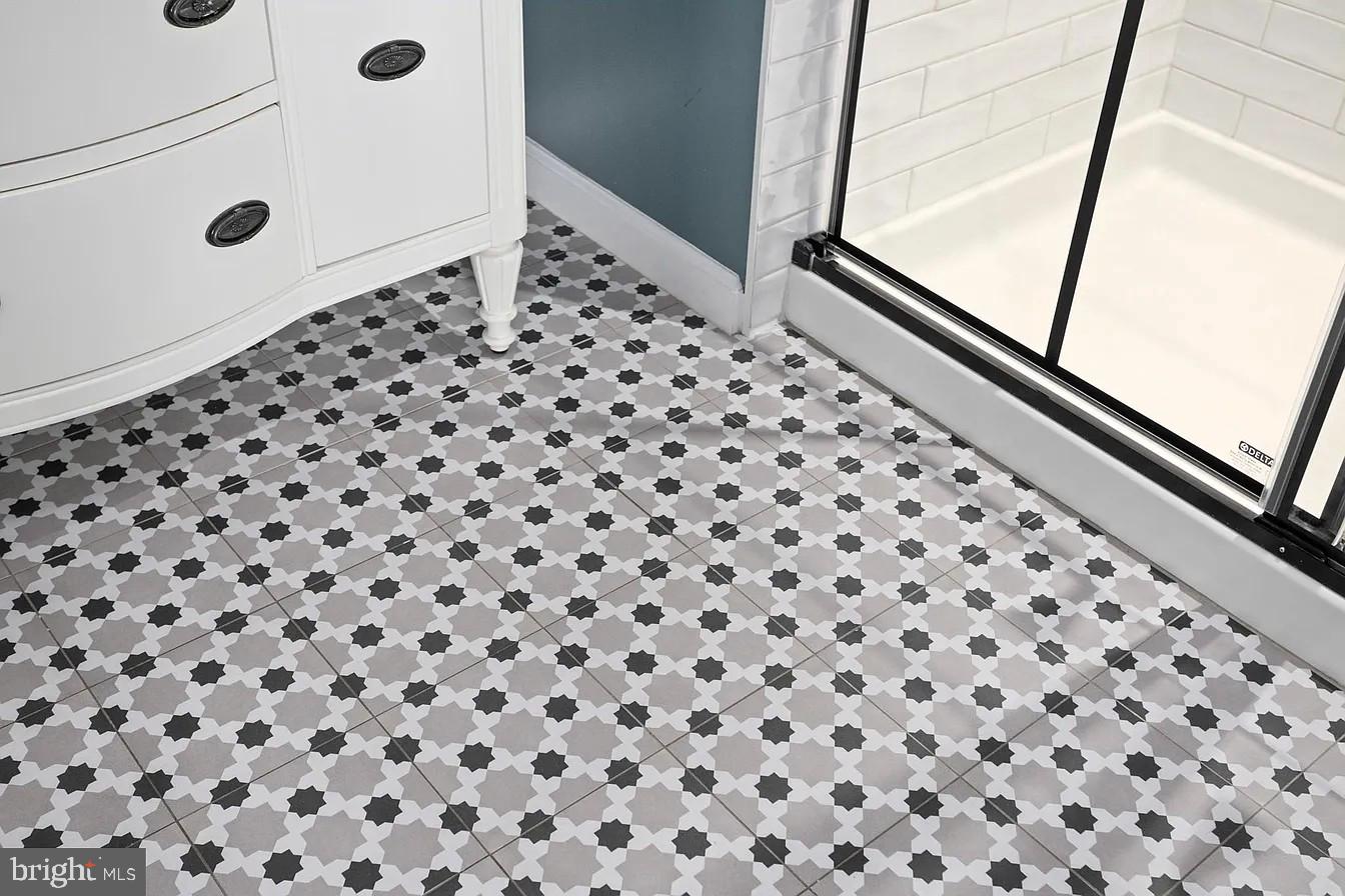 433 Mowat Circle Hamilton, NJ 08690 - Photo 23 of 36 Elegant patterned tile flooring.