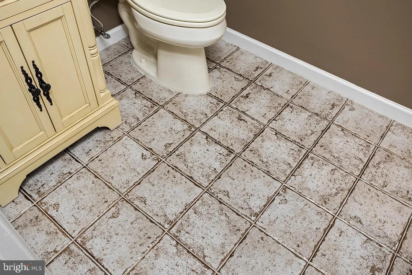 433 Mowat Circle Hamilton, NJ 08690 - Photo 28 of 36 Charming vintage-style bathroom floor.