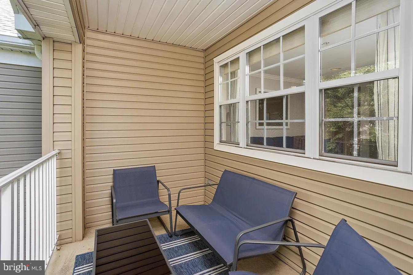 433 Mowat Circle Hamilton, NJ 08690 - Photo 30 of 36 Cozy porch retreat with natural light.