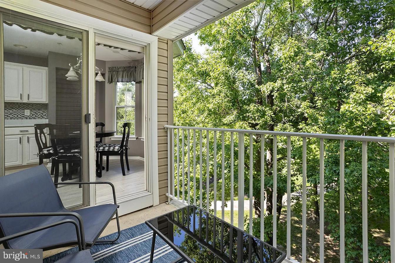 433 Mowat Circle Hamilton, NJ 08690 - Photo 31 of 36 Serene balcony with lush greenery views.