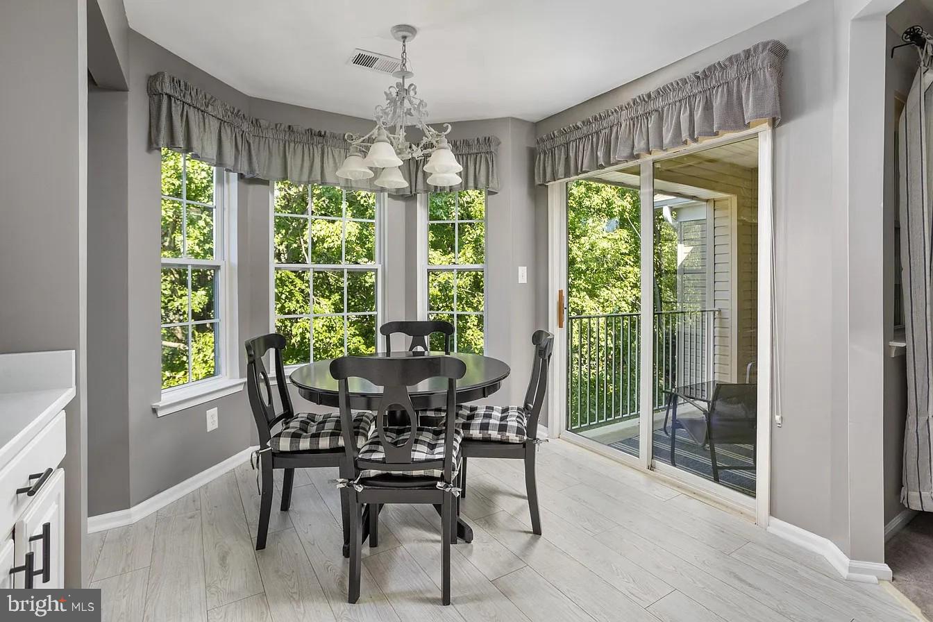 433 Mowat Circle Hamilton, NJ 08690 - Photo 10 of 36 Bright dining nook with scenic views.