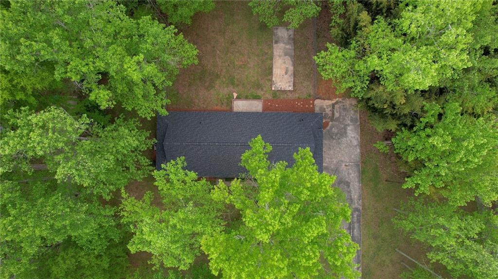 555 Joy Street Jackson, GA 30233 - Photo 56 of 56 an aerial view of a house with a yard and potted plants