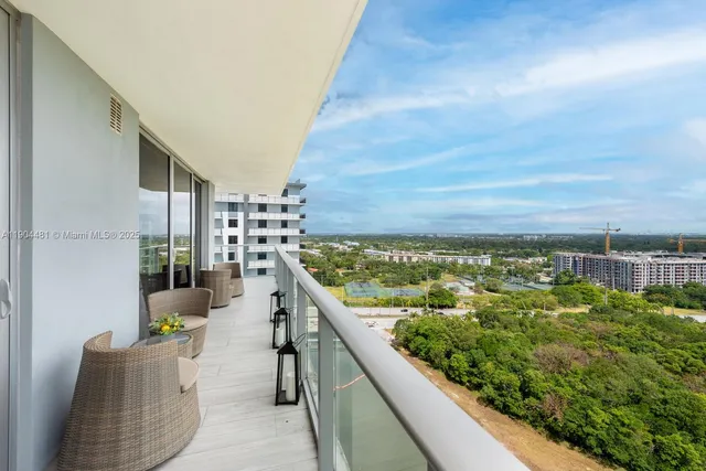 a view of balcony with furniture
