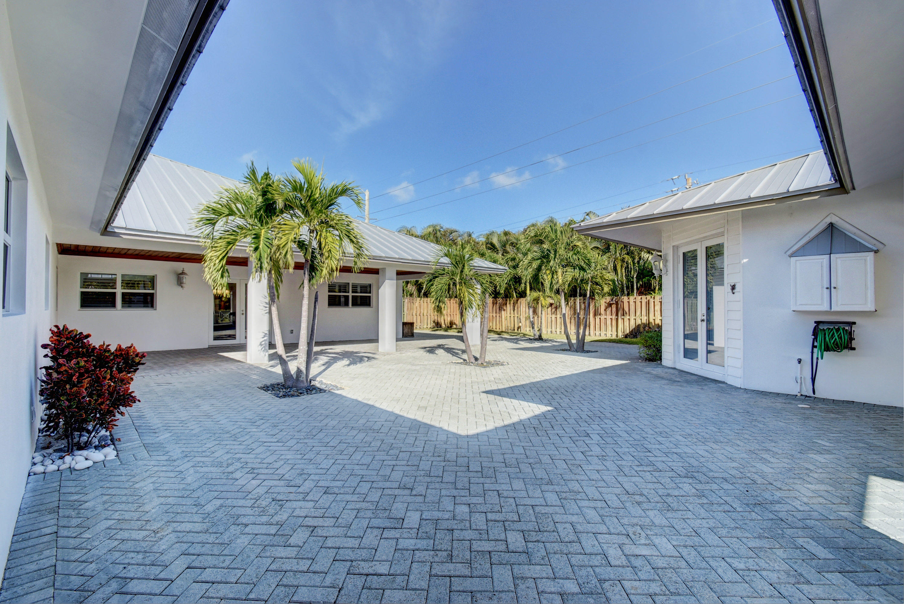 910 Southwest 21st Lane Boca Raton, FL 33486 - Photo 42 of 70 Covered Patio #1 and Courtyard