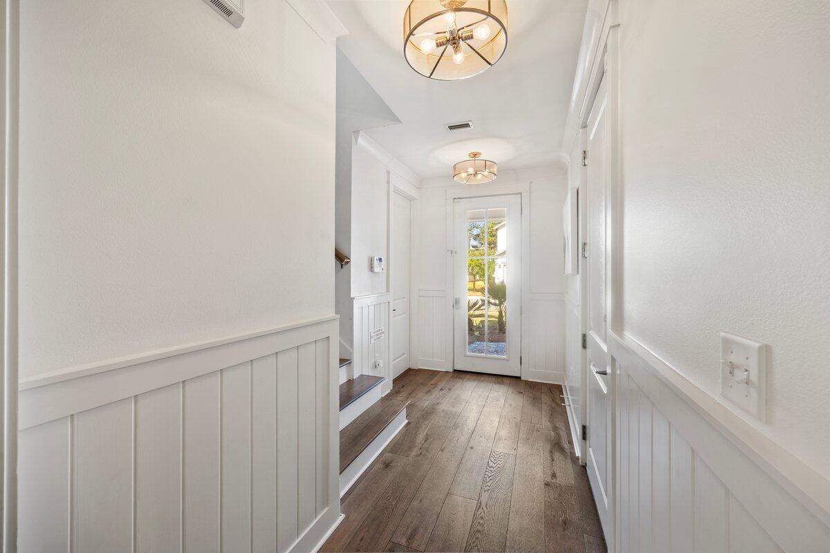 46 Lake Street Miramar Beach, FL 32550 - Photo 20 of 56 a view of a hallway with wooden floor