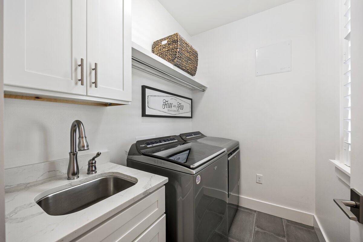 46 Lake Street Miramar Beach, FL 32550 - Photo 21 of 56 a kitchen with a sink and cabinets