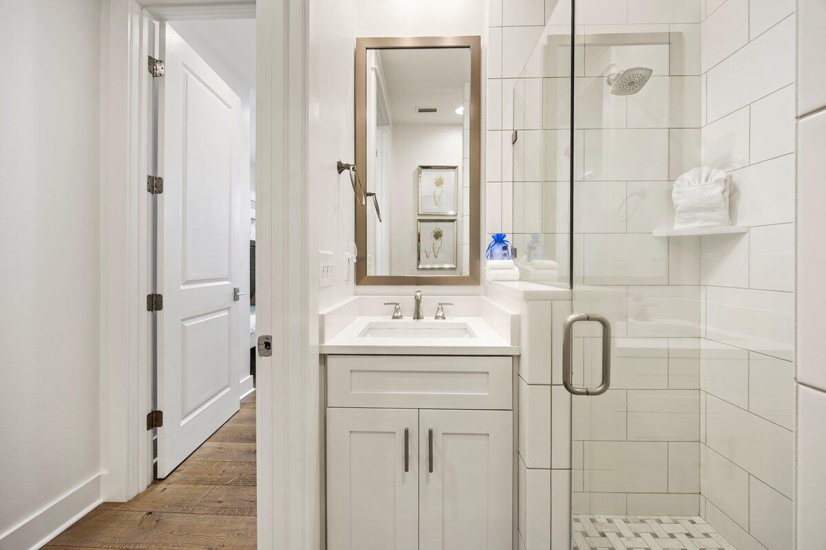 46 Lake Street Miramar Beach, FL 32550 - Photo 29 of 56 a bathroom with a sink a toilet and shower
