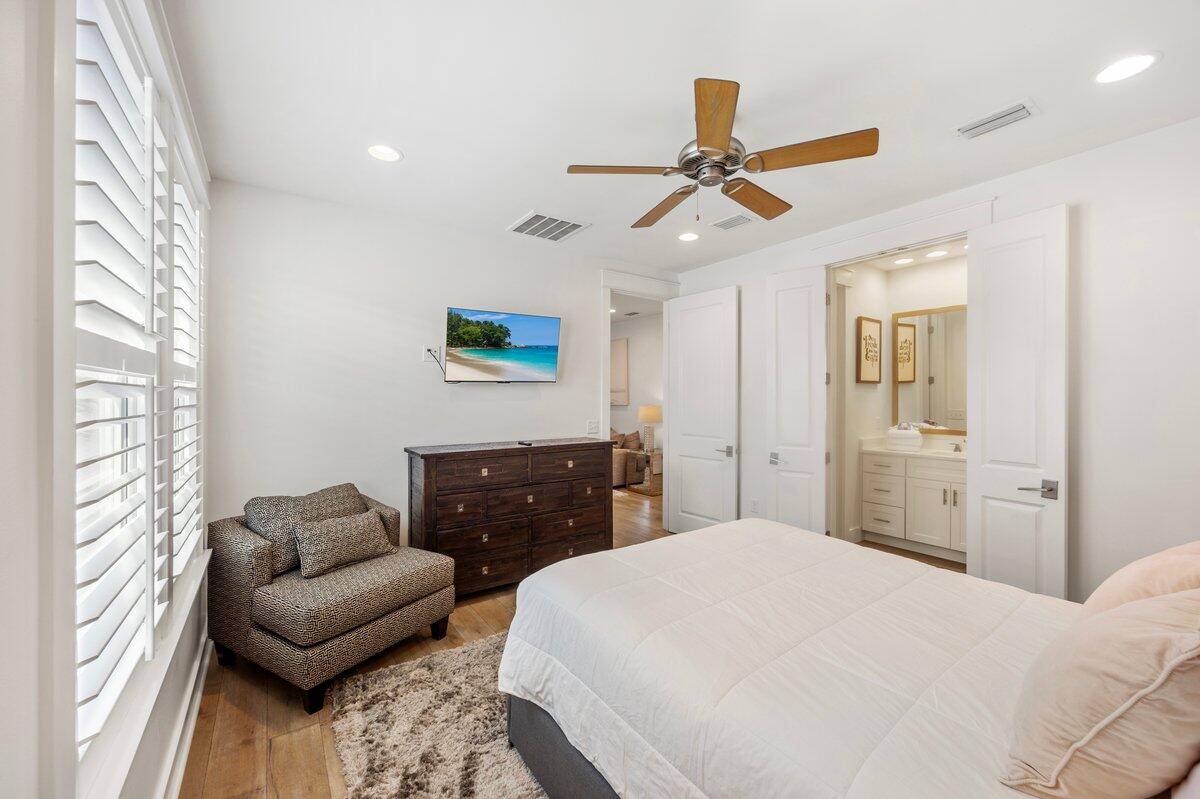 46 Lake Street Miramar Beach, FL 32550 - Photo 37 of 56 a bedroom with a bed and ceiling fan