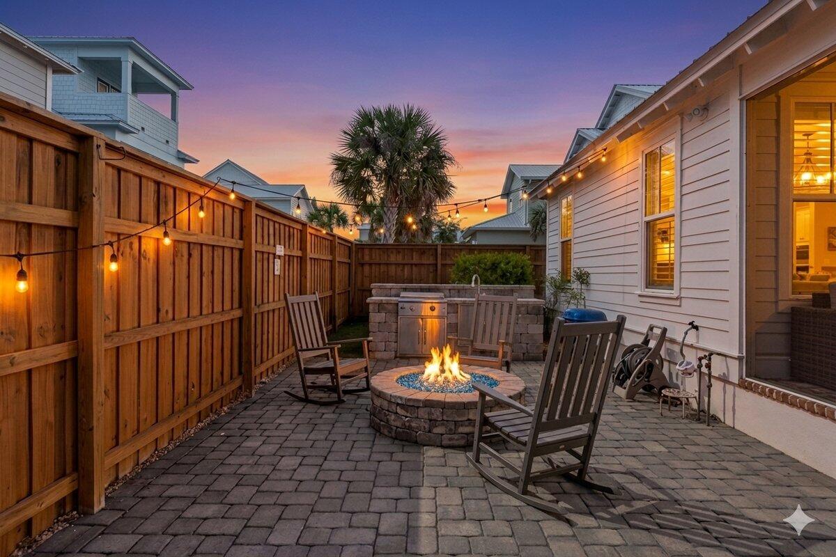 46 Lake Street Miramar Beach, FL 32550 - Photo 48 of 56 a view of a patio with a table and chairs