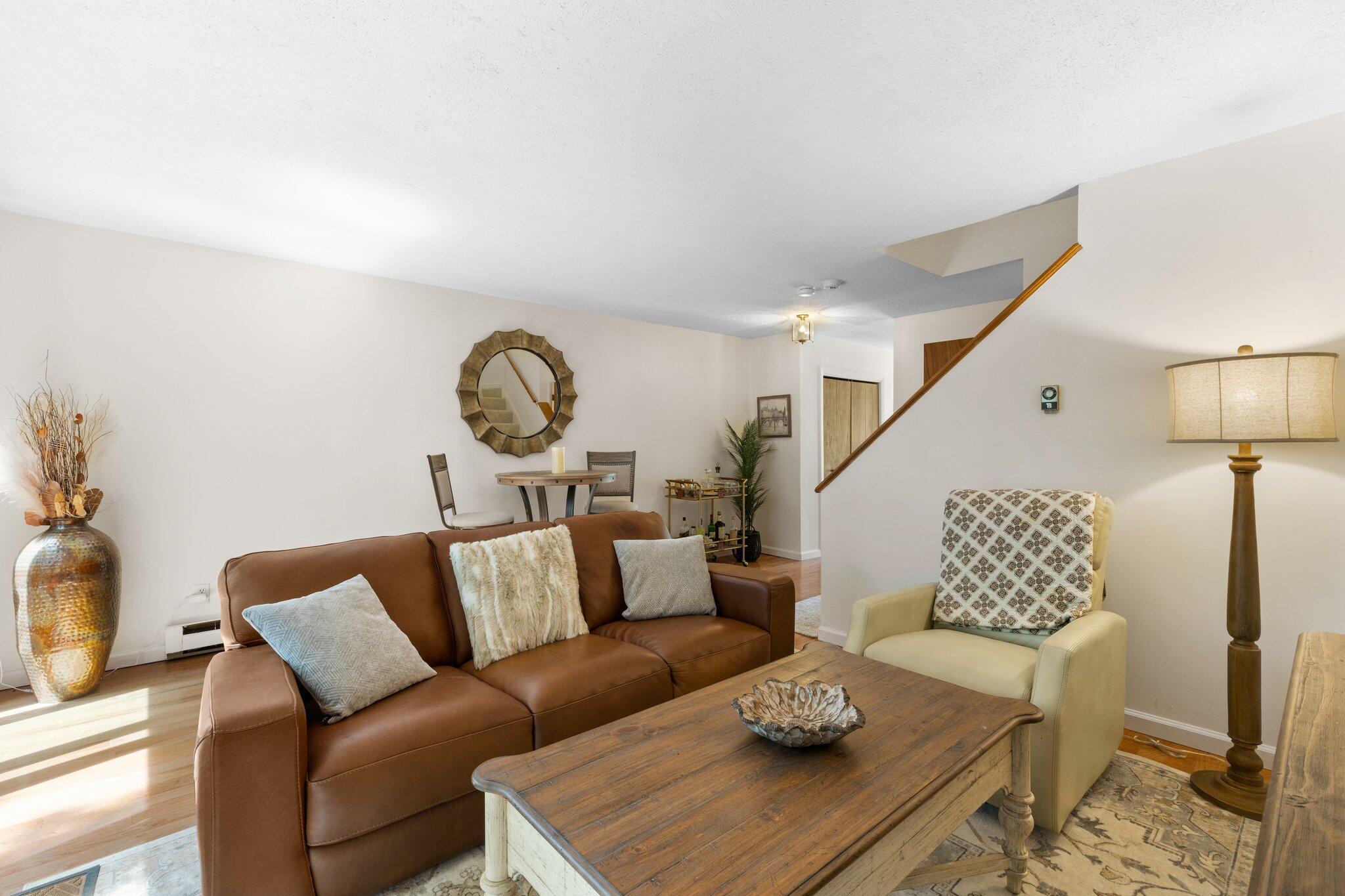 56 Round House Road Bourne, MA 02532 - Photo 11 of 29 living room to stairway