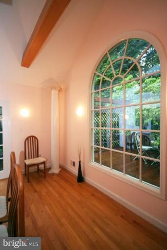 9220 Whitney Street Silver Spring, MD 20901 - Photo 29 of 30 a view of a room with wooden floor and windows