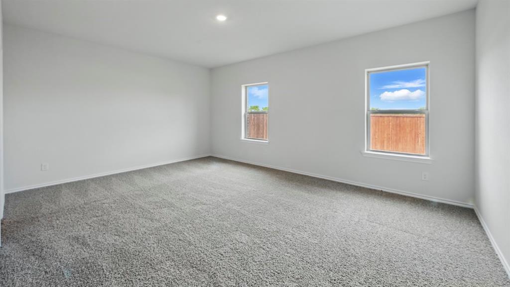 1608 Basalt Lane Celina, TX 75009 - Photo 12 of 36 an empty room with a window