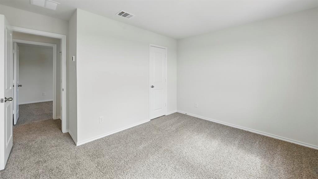 1608 Basalt Lane Celina, TX 75009 - Photo 17 of 36 a view of an empty room
