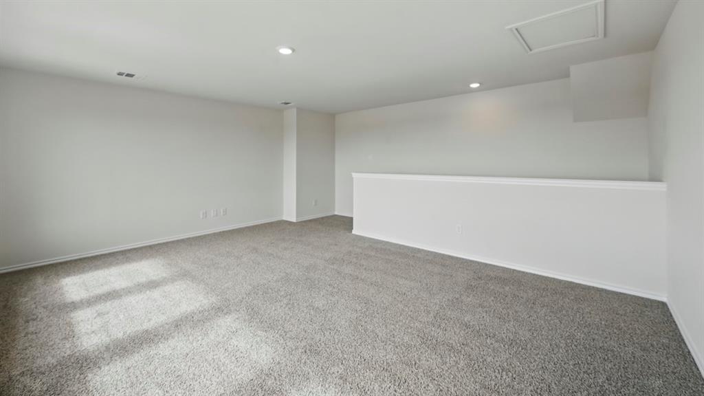 1608 Basalt Lane Celina, TX 75009 - Photo 19 of 36 a view of an empty room
