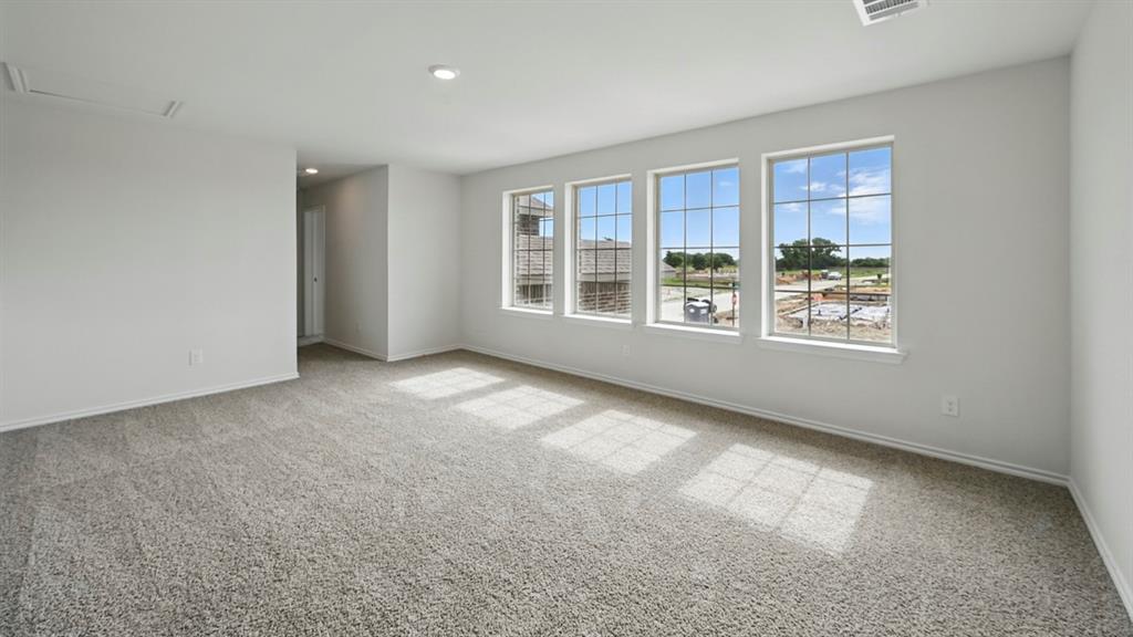 1608 Basalt Lane Celina, TX 75009 - Photo 20 of 36 a view of an empty room with a window