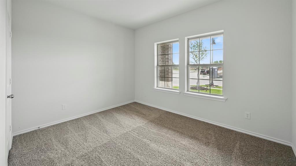 1608 Basalt Lane Celina, TX 75009 - Photo 10 of 36 an empty room with windows