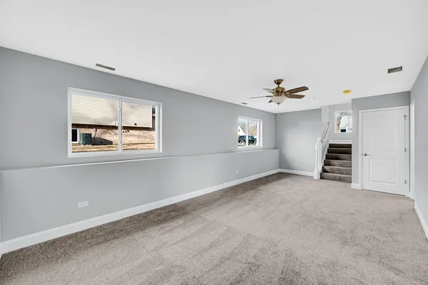a view of empty room with windows