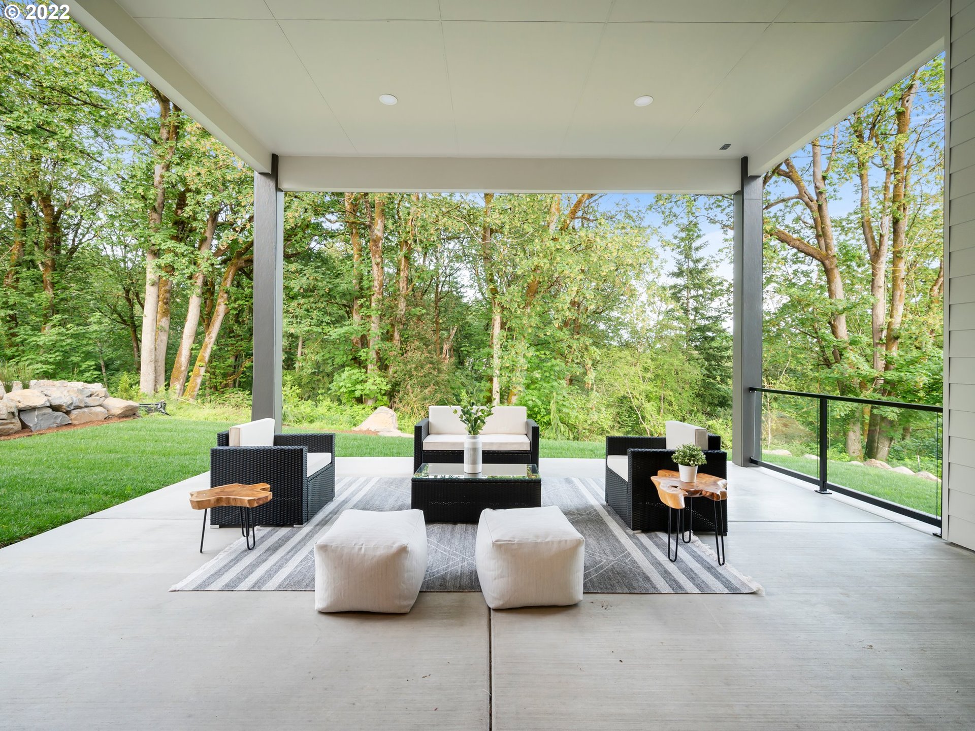 4713 Southeast Ascension Drive Camas, WA 98607 - Photo 12 of 32 a living room with patio furniture and a garden