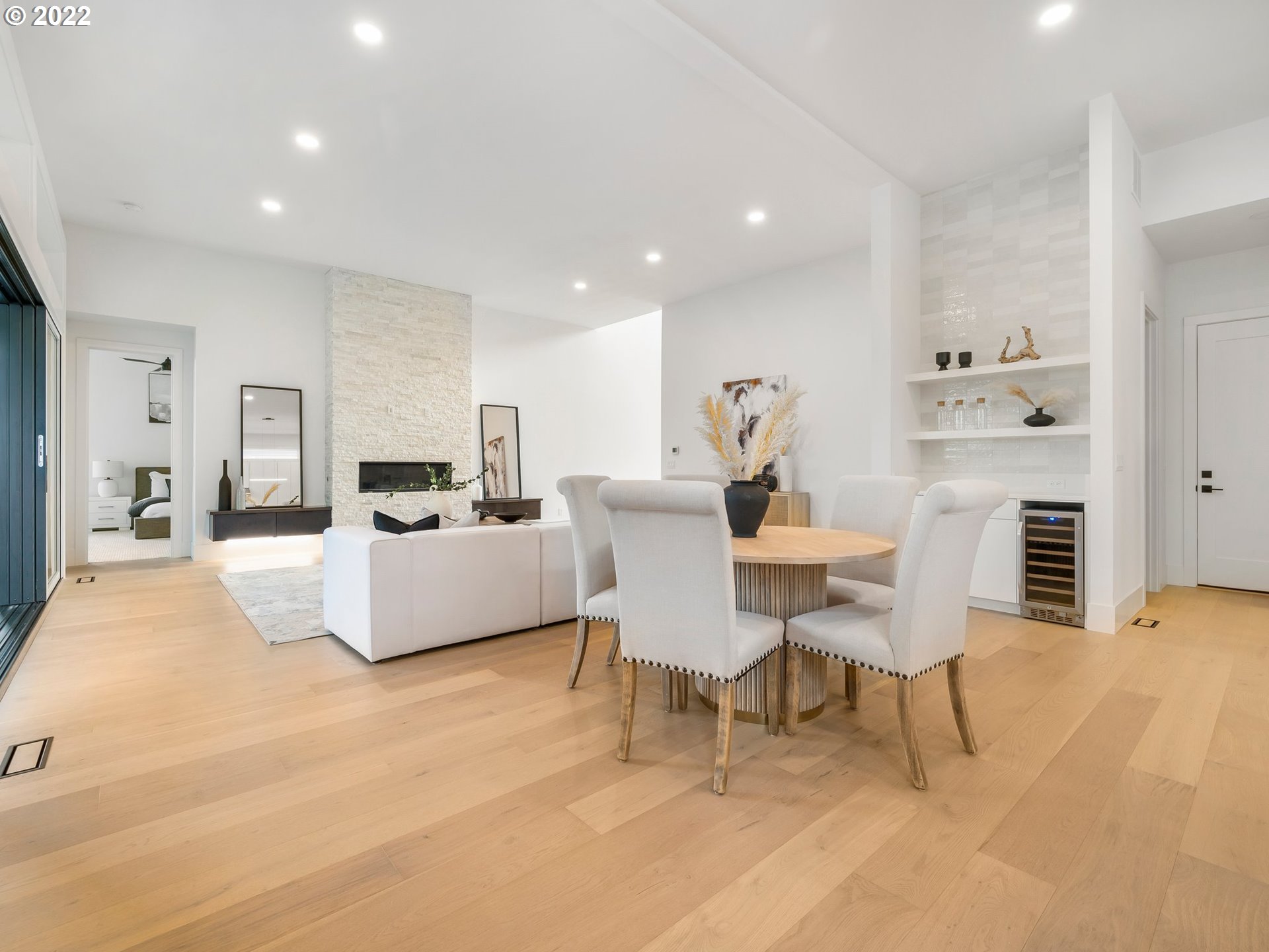 4713 Southeast Ascension Drive Camas, WA 98607 - Photo 14 of 32 a living room with furniture a dining table and kitchen view