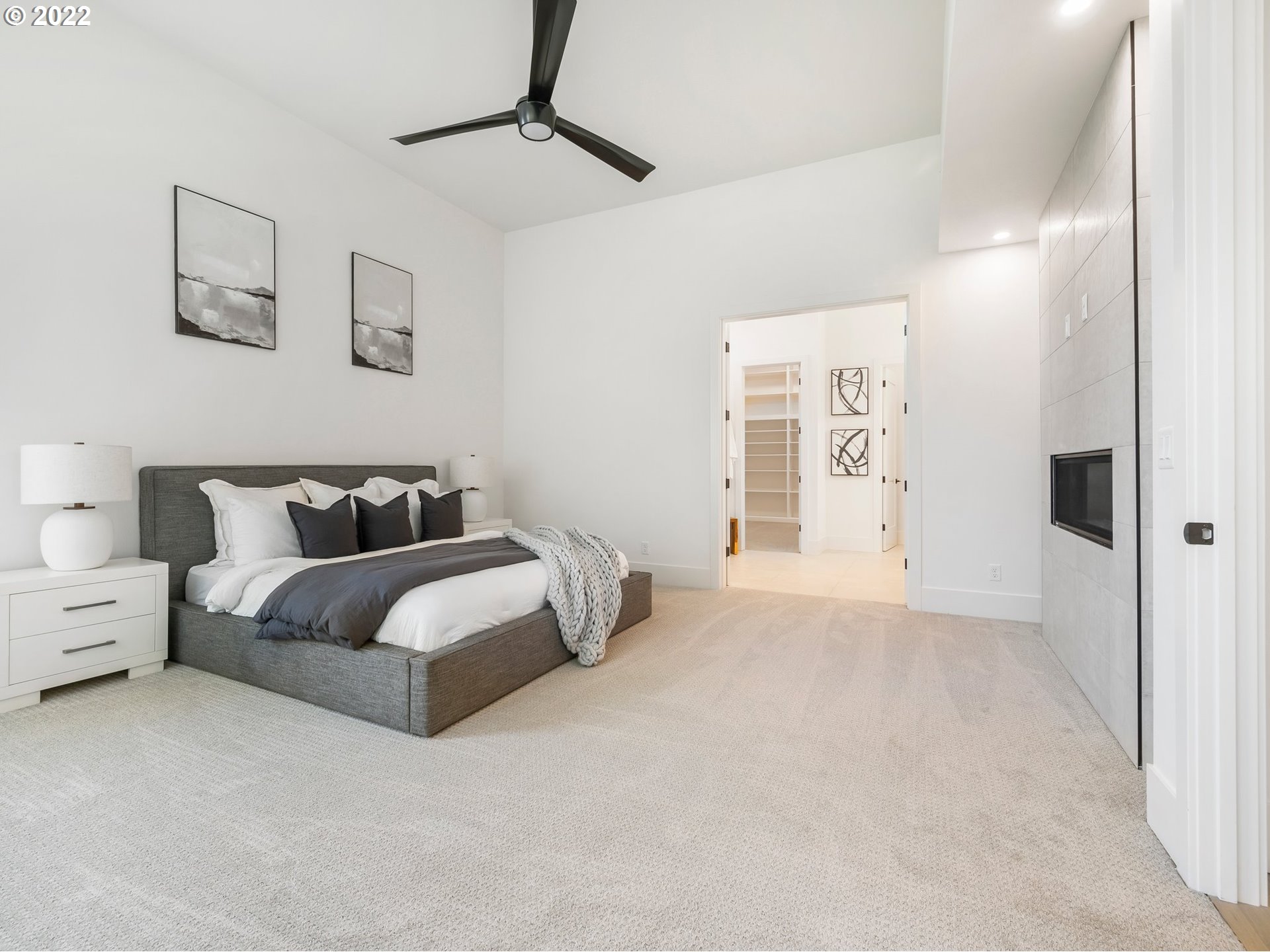 4713 Southeast Ascension Drive Camas, WA 98607 - Photo 15 of 32 a spacious bedroom with a bed and a walk in closet