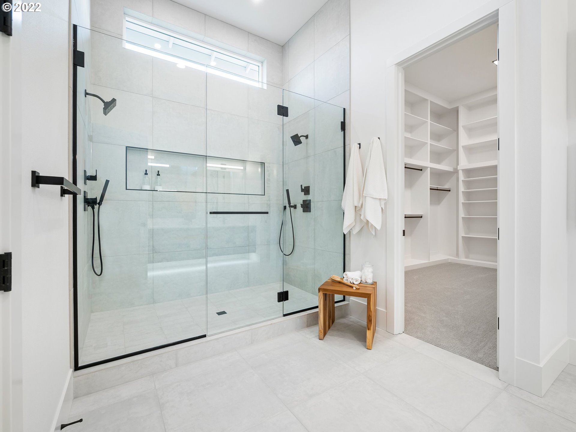 4713 Southeast Ascension Drive Camas, WA 98607 - Photo 18 of 32 a bathroom with a glass shower door