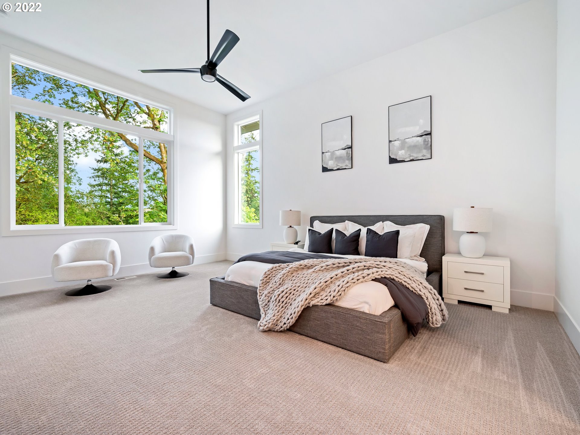 4713 Southeast Ascension Drive Camas, WA 98607 - Photo 21 of 32 a spacious bedroom with a bed and a couch