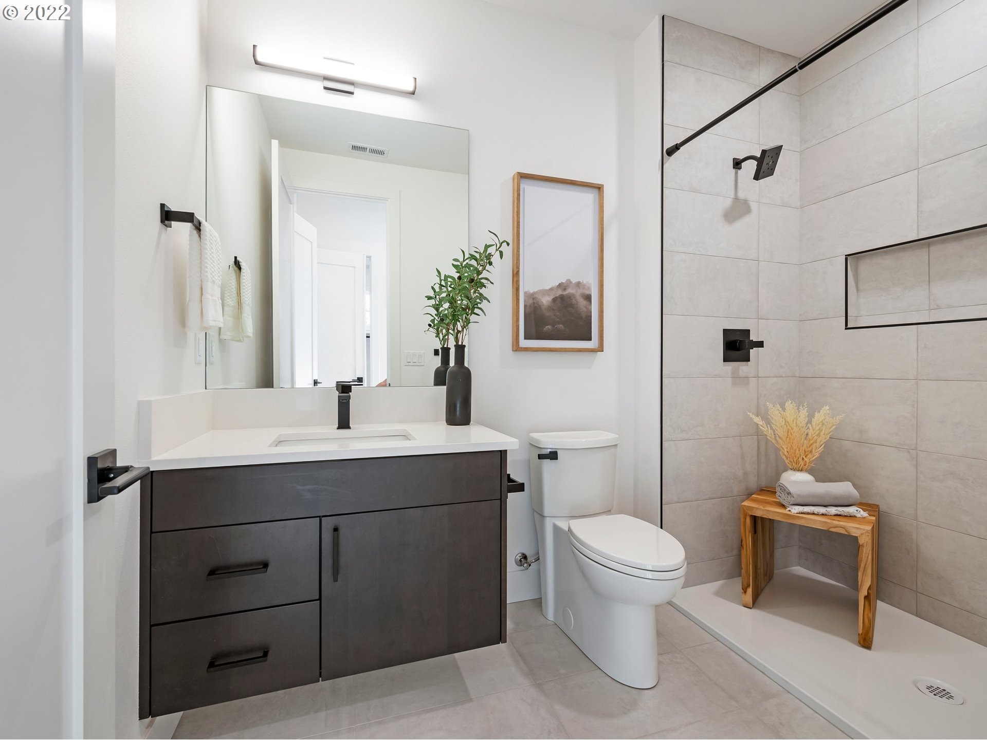 4713 Southeast Ascension Drive Camas, WA 98607 - Photo 28 of 32 a bathroom with a toilet sink and mirror