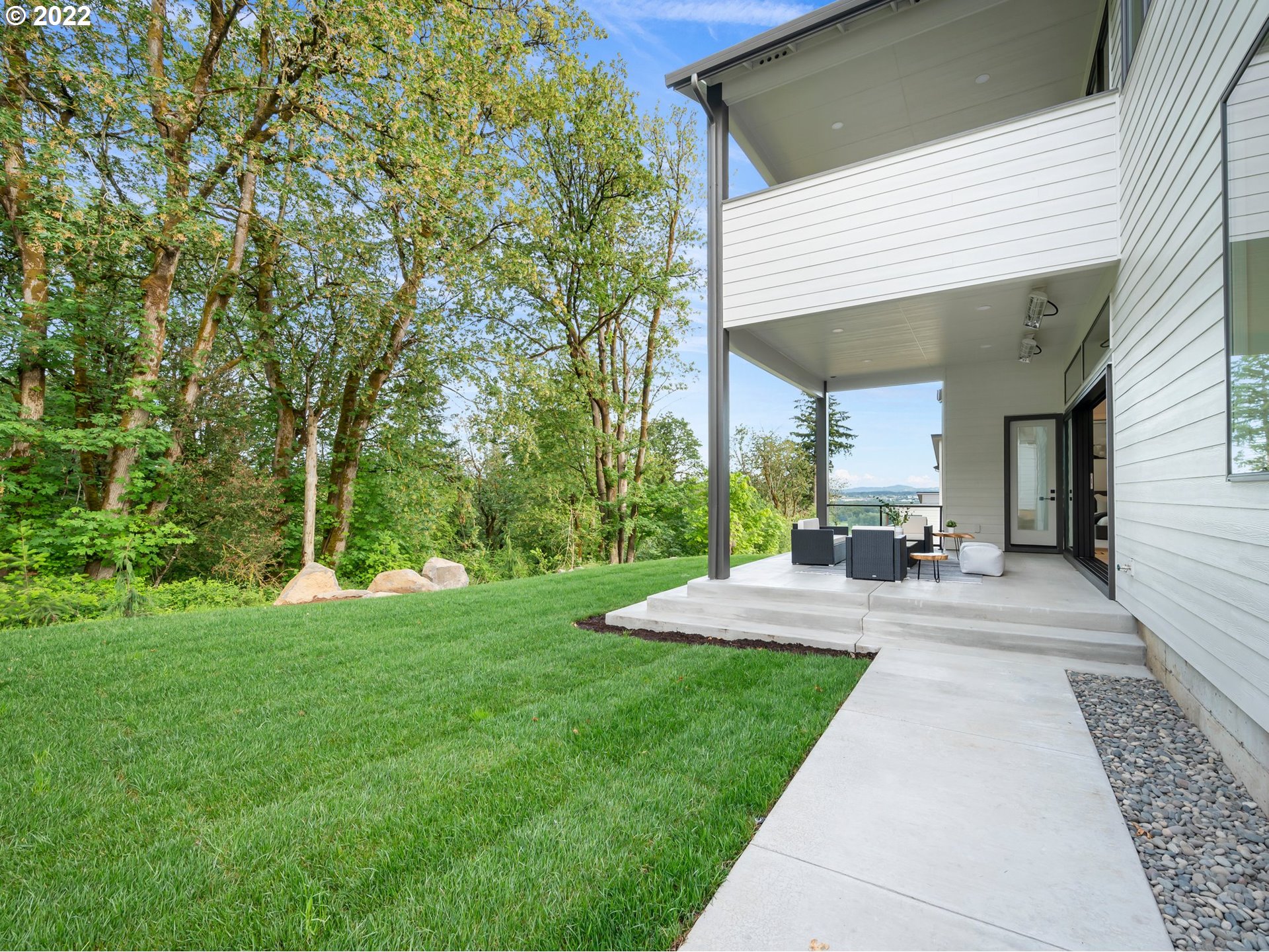 4713 Southeast Ascension Drive Camas, WA 98607 - Photo 31 of 32 a view of a house with backyard and porch