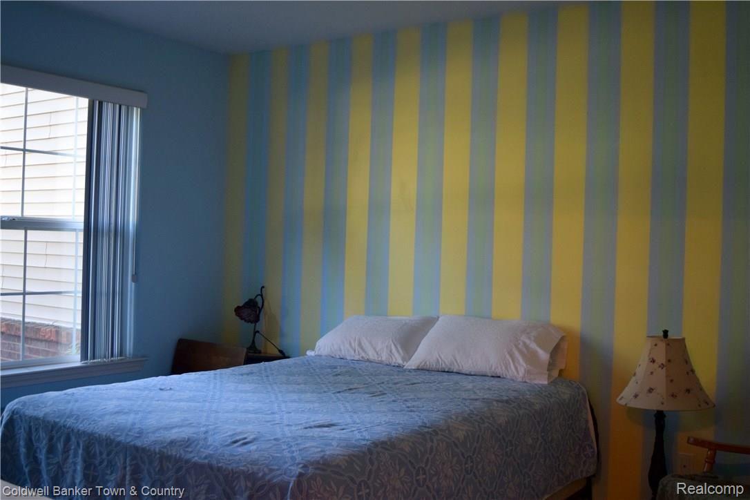 4175 Hampton Ridge Boulevard, Unit 39 Howell, MI 48843 - Photo 11 of 15 guest bedroom.jpg