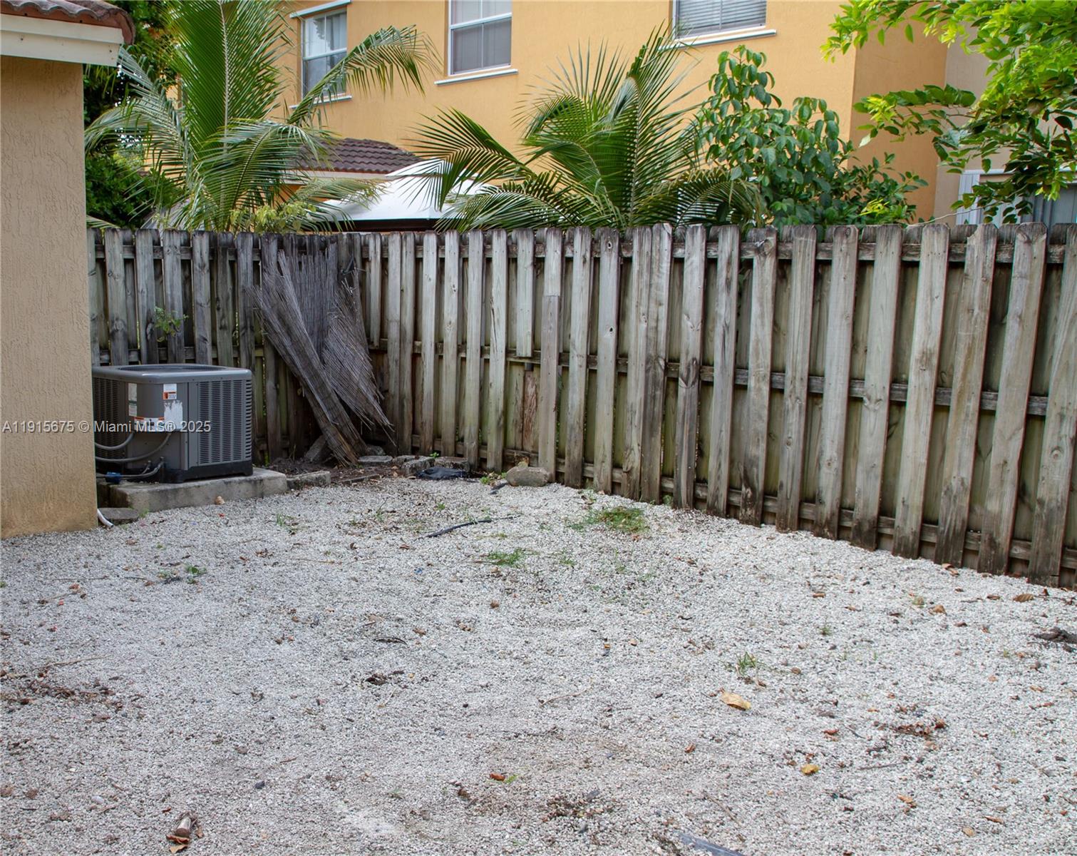 761 Southeast 2nd Street, Unit 761 Homestead, FL 33030 - Photo 4 of 12 a view of wooden fence