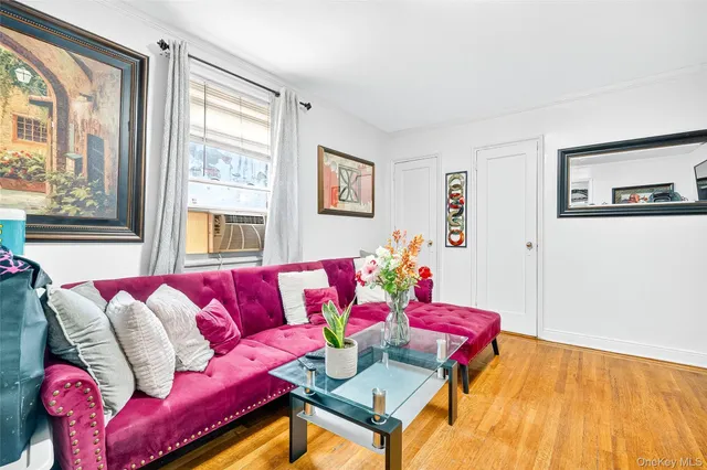 a kitchen with stainless steel appliances granite countertop a stove a dining table and chairs