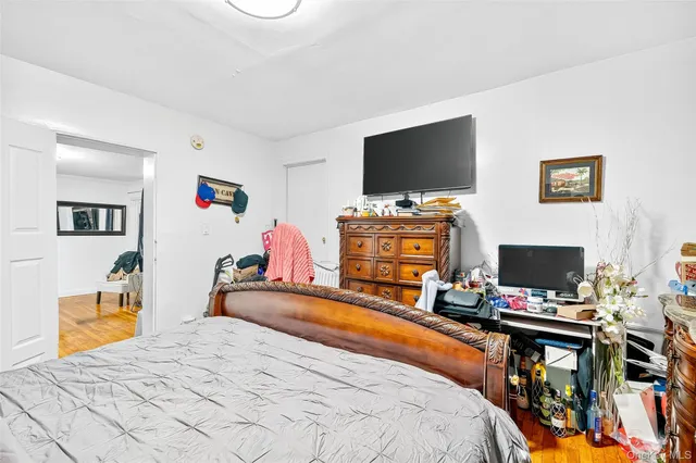 a bedroom with a workspace