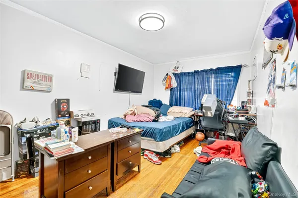a bedroom with furniture and a bed