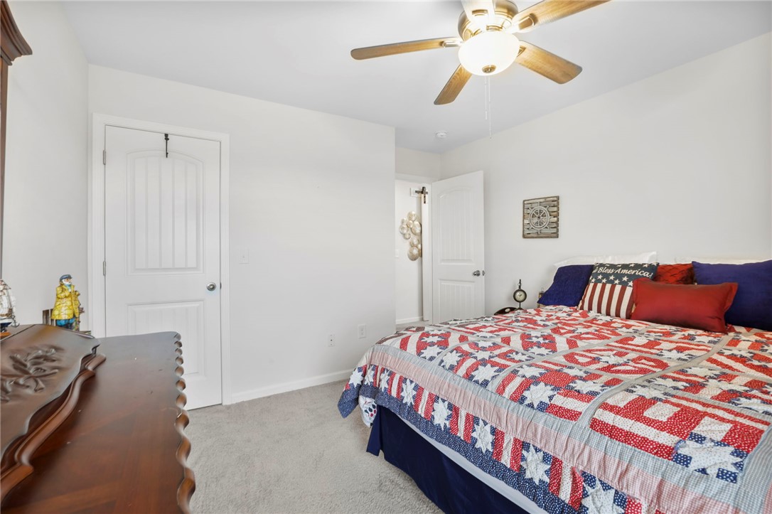 251 Samuel Street Pendleton, SC 29670 - Photo 19 of 37 This cozy bedroom offers a tranquil retreat with plush carpeting and ample natural light.